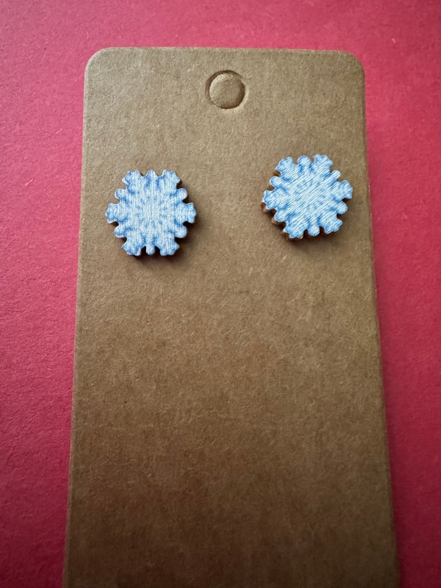white snowflake studs